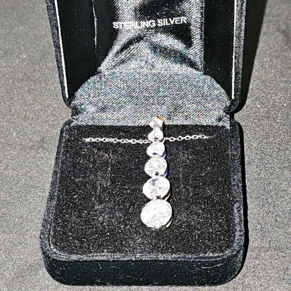 Elegant Sterling Silver Necklace with Clear Stones (CZ).